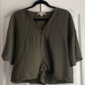 Loose fitting button down and tie bottom blouse